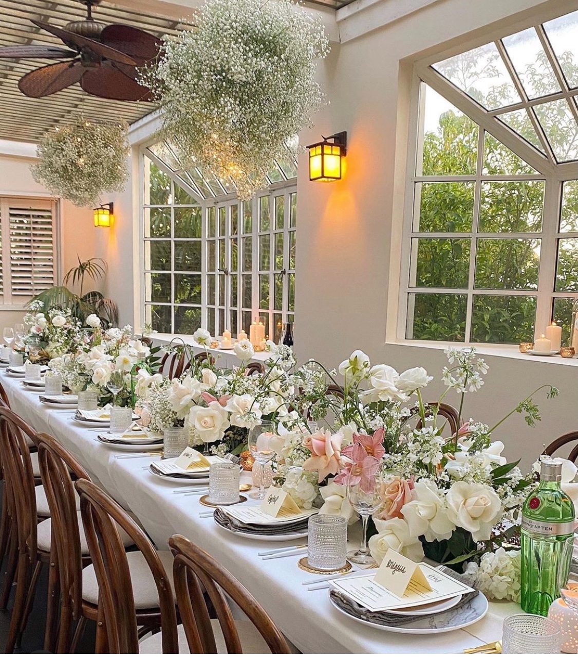 Conservatory dinner, whites and baby's breath