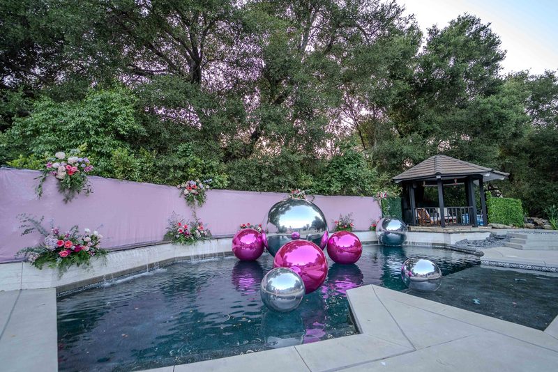 Mirrored spheres on the pool, afternoon light