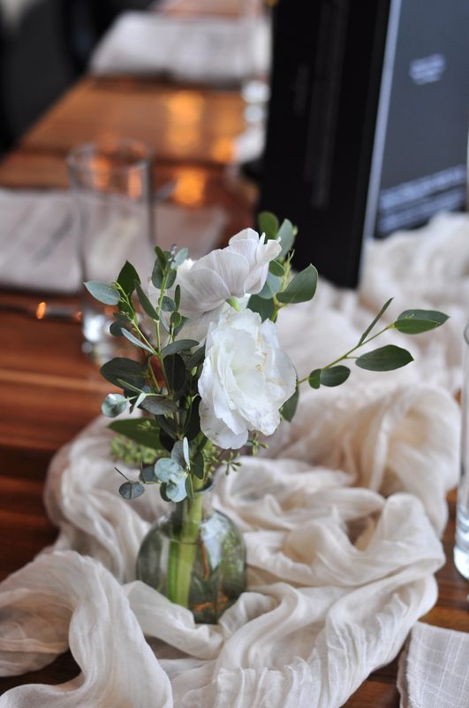 Bud vase and menu card
