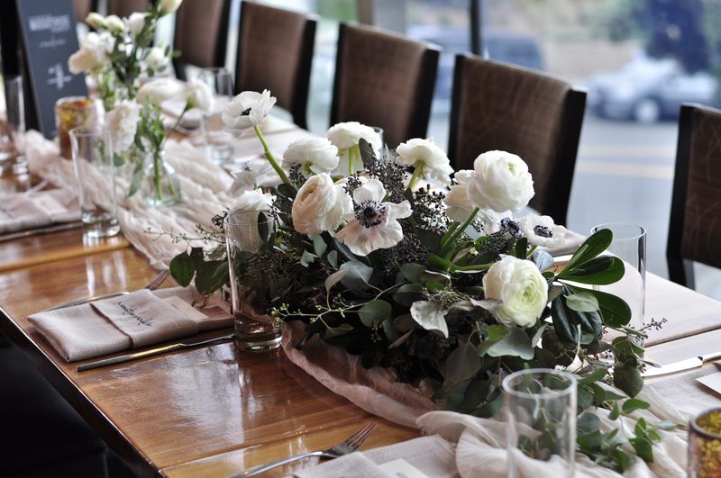 Long table, white ranunculus and anemone