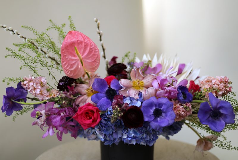 Purple anemone and anthurium